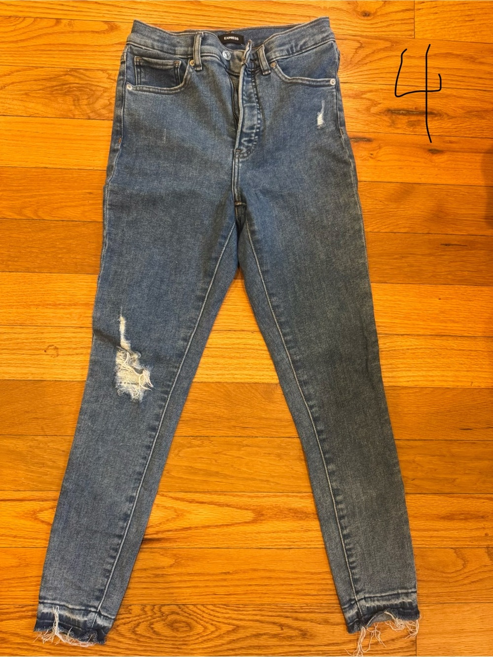 Two pairs of Express Skinny Jeans